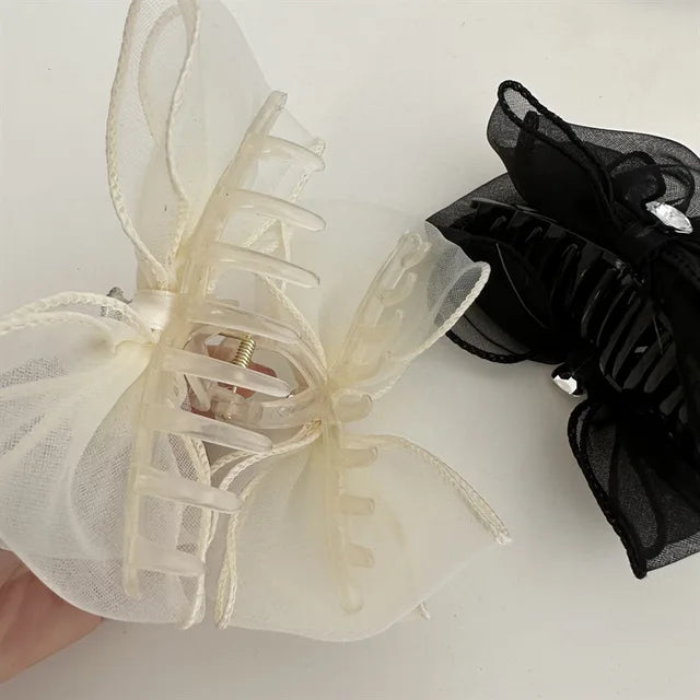 Jumbo satin bow hair claw clutch