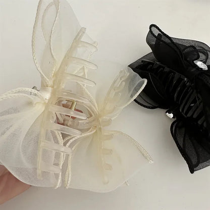 Jumbo satin bow hair claw clutch