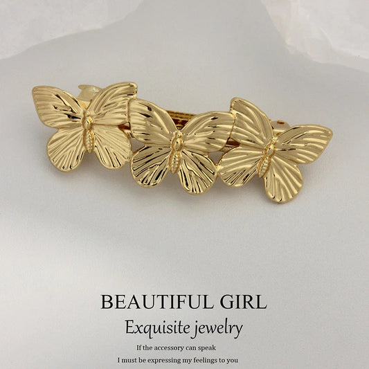 Golden butterfly metal hair clip